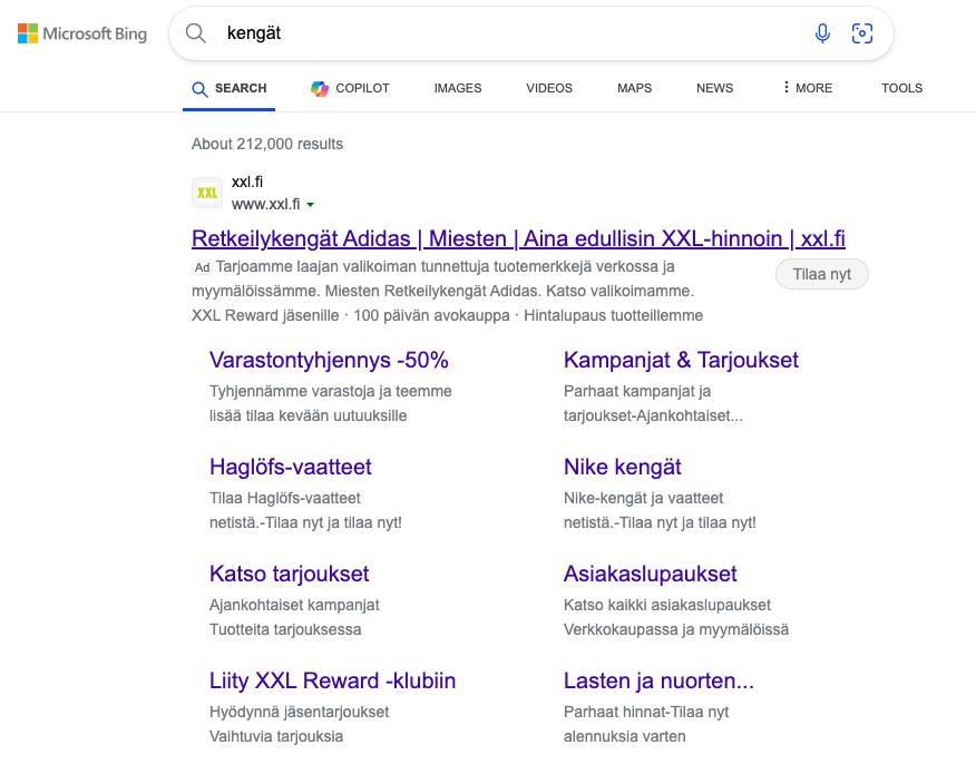 Urheiluliikkeen mainos Bingin hakutuloksissa kengät-hakusanalla.